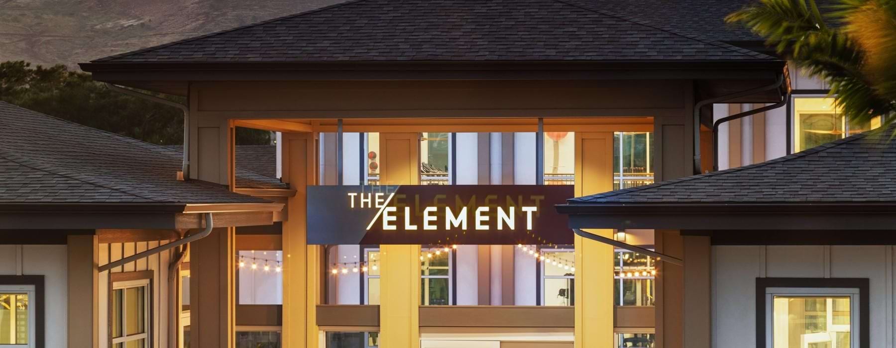 a building with a mountain in the background