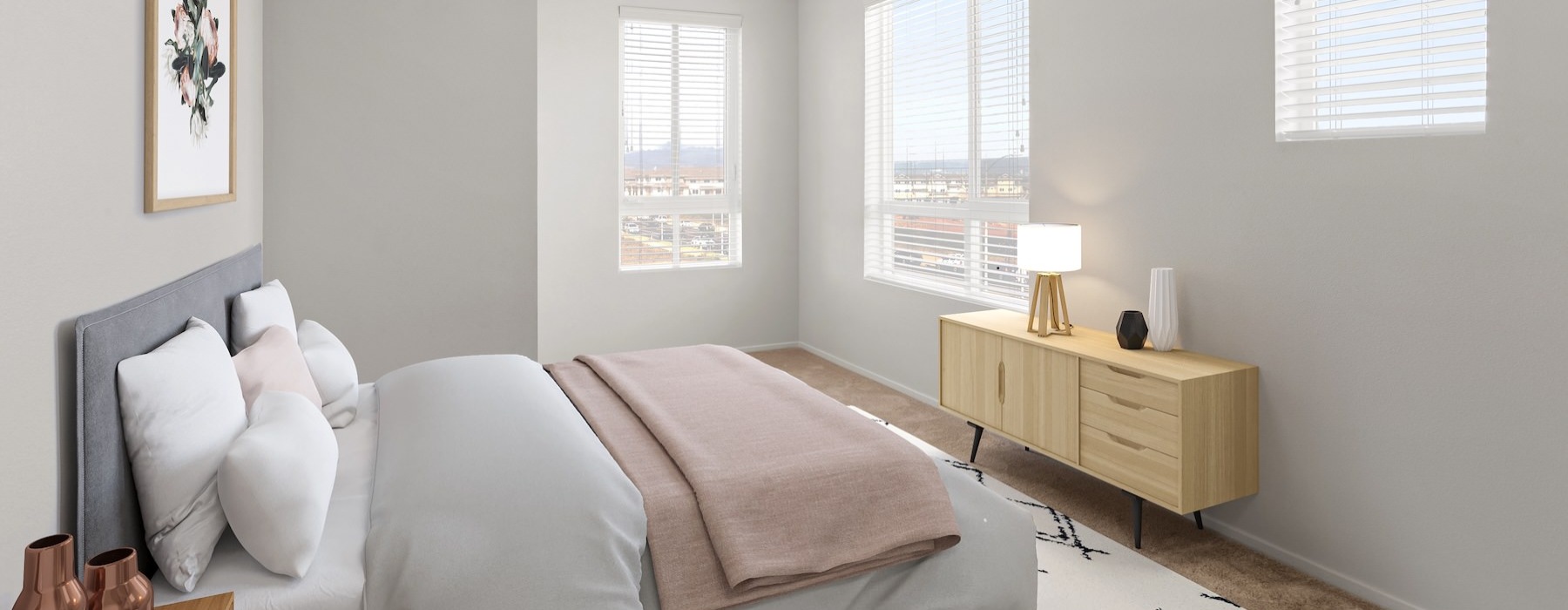 a bedroom with a bed and a dresser